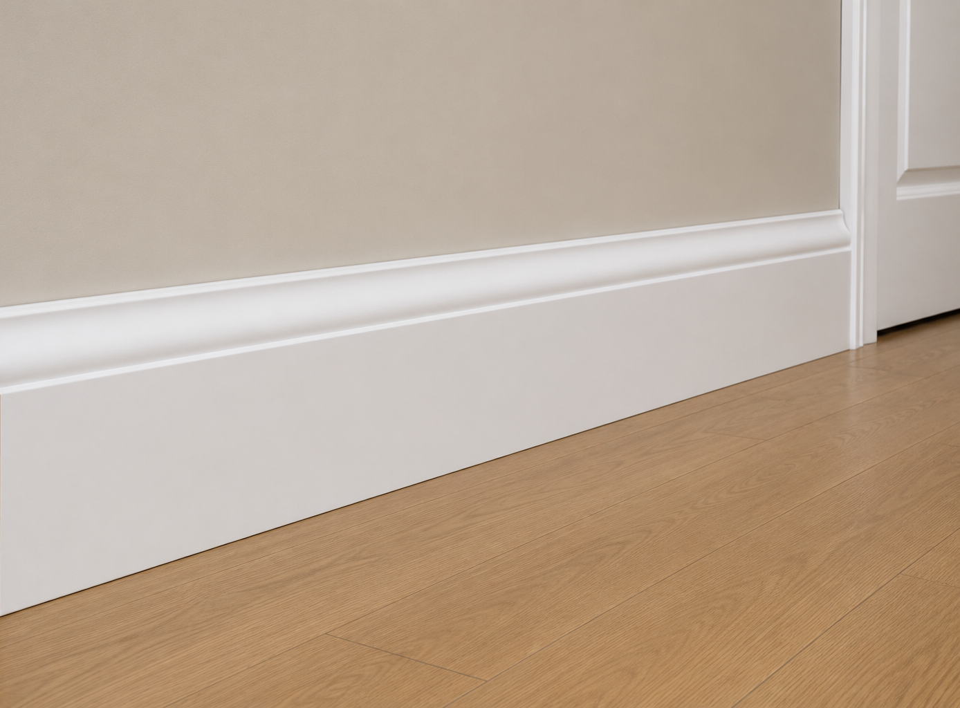White Primed Baseboard 9/16